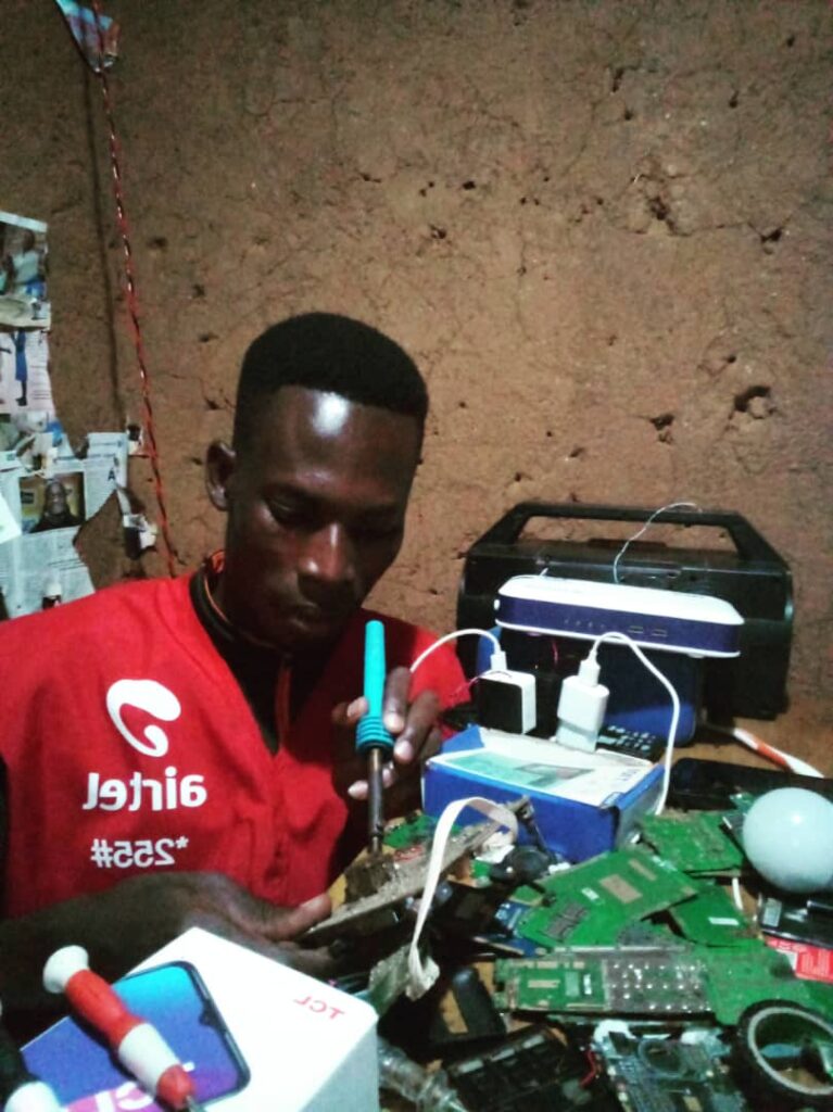 One of young beneficiaries of Kabuga cell in Rugabano sector who started his IGA(selling small spare parts of  Radio, telephones and their reparation).